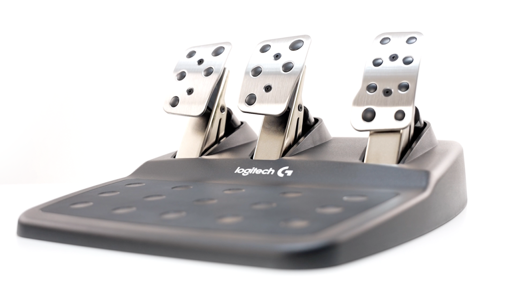 Logitech G29 and G920 sim racing pedals with a white background